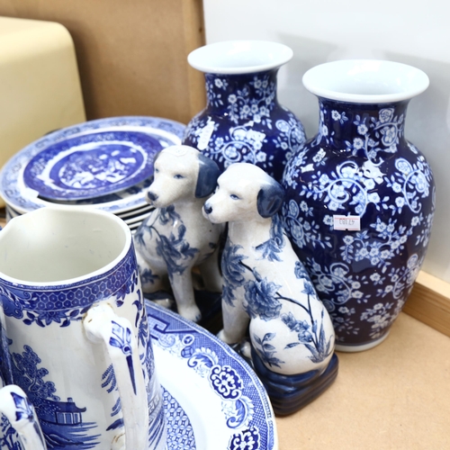 712 - Various blue and white ceramics, including Willow pattern meat plate, dinner plates, jugs etc