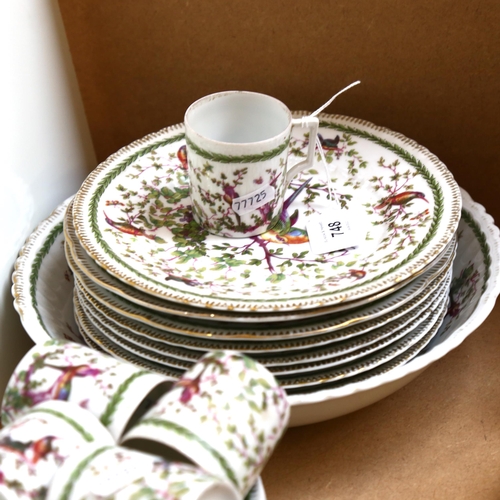 748 - Continental coffee cans and saucers, with bird and floral decoration, matching plates and bowl