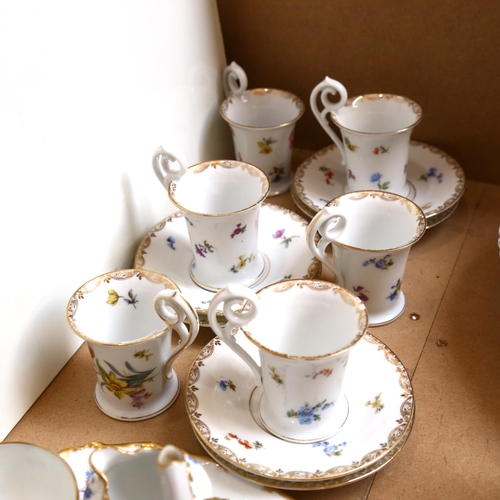 749 - German porcelain coffee cups and saucers, and a French teapot, matching tray etc