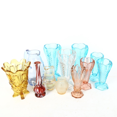 802 - A shelf of 1930s moulded glass vases, jugs etc