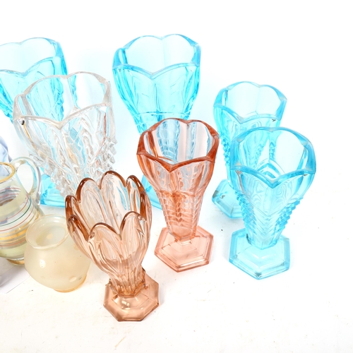 802 - A shelf of 1930s moulded glass vases, jugs etc