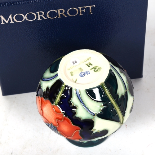 813 - A Moorcroft Poppy pattern squat vase, dated '96, height 8cm, boxed