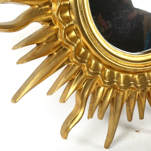 837 - A modern gold painted sunburst wall mirror, overall diameter 96cm