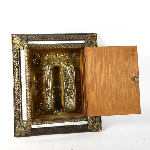 839 - A bras-fronted mirror wall cabinet, with brass brushes inside, overall 40cm x 35cm