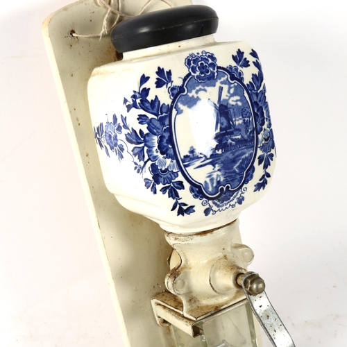 849 - An Antique Dutch blue and white transfer ceramic windmill nutmeg grater, height 33cm