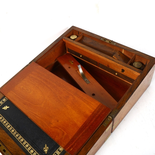 896 - A Victorian brass-bound walnut writing slope, with fitted interior and 2 inkwells, 35cm across