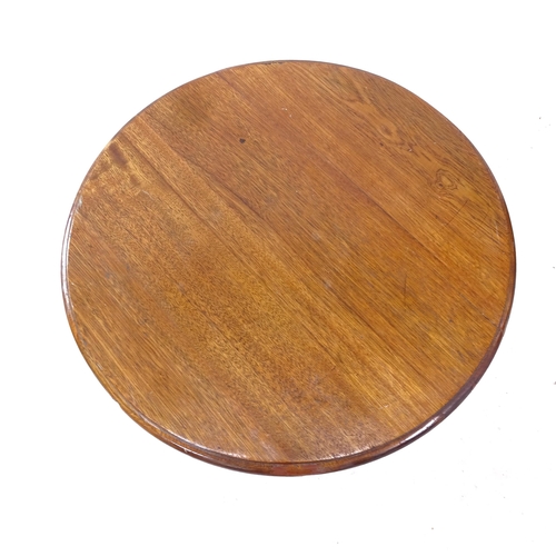 2331 - A cast-iron and embossed pub table with circular top, D59cm, H70cm