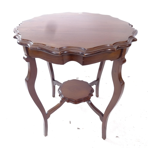 2336 - A mahogany 2-tier lamp table of shaped form, W62cm H72cm