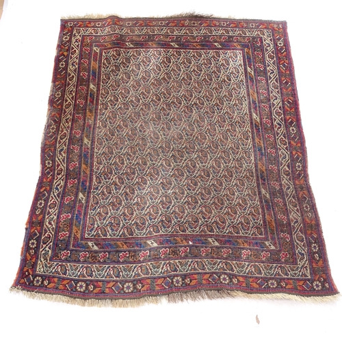 2374 - An Antique red ground Afghan rug, with symmetrical border, 155cm x 128cm