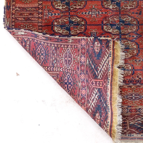 2378 - A 19th century red ground Tekke rug, 132cm x 94cm