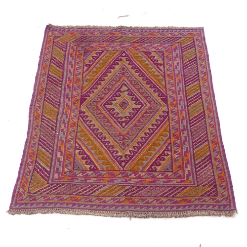 2398 - A red ground Gazak rug, 131cm x 110cm