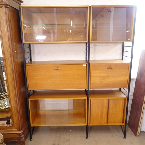 2399 - A mid-century Staples Ladderax shelving unit, comprising 3 uprights, 3 glazed cabinets, 2 drop-front... 