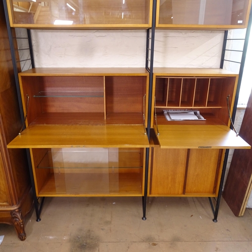 2399 - A mid-century Staples Ladderax shelving unit, comprising 3 uprights, 3 glazed cabinets, 2 drop-front... 