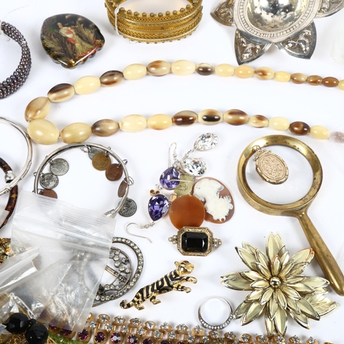 1235 - A quantity of mixed costume jewellery, brooches, cameos, and gilt-metal bangle