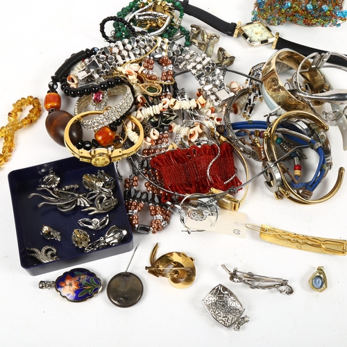 1256 - A box of fashion wristwatches and costume jewellery, a leaf design sterling silver brooch, badge etc