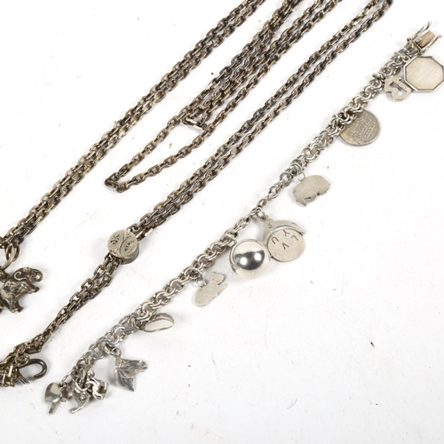 1276 - A white metal long guard chain with charms, and a novelty silver charm bracelet (2)