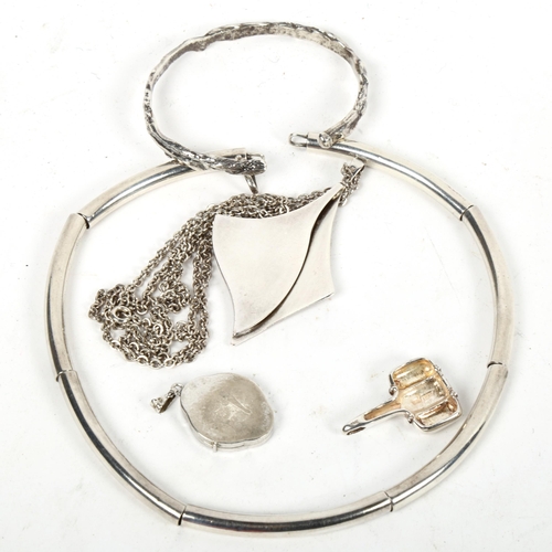 1290 - A collection of stylised silver jewellery, to include a bangle, pendant necklace etc