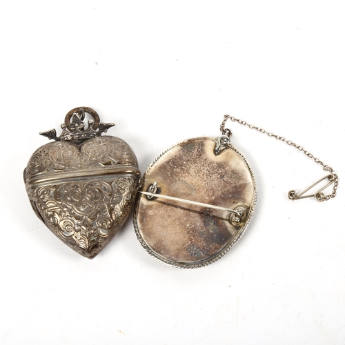 1296 - A miniature printed portrait brooch, and an embossed plated heart-shaped photo locket with crown fin... 