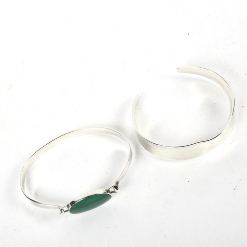 1297 - N. E. FROM - 2 stylised sterling silver bangles, 1 set with malachite panel