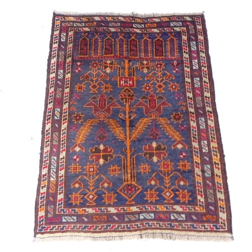 2312 - A blue ground Baluchi rug, 113cm x 84cm