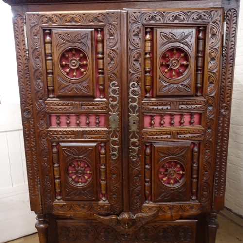 2134 - A Bretton French oak 2-door hall cupboard, with 2 fitted drawers below, with allover carved and pier... 