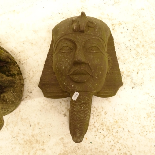 2719 - A weathered concrete garden pig ornament, L35cm, and a terracotta wall mask of Egyptian Pharaoh, H40... 