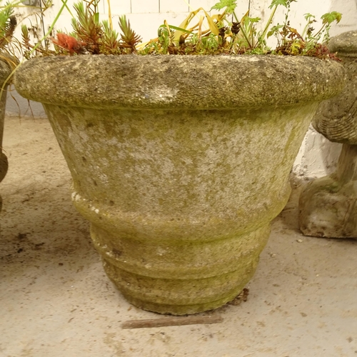 2721 - A pair of weathered concrete circular garden planters, D40cm, H32cm