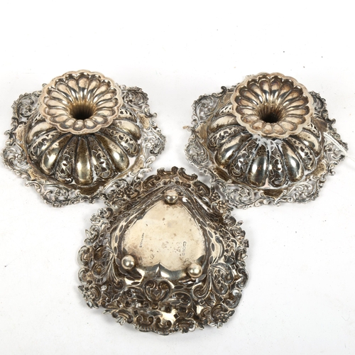 1338 - A pair of Edward VII silver bon bon dishes of small size, with allover scrolled embossed and pierced... 