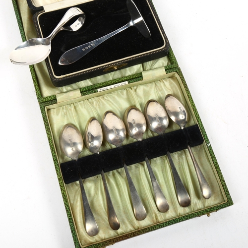 1352 - A set of 6 Edward VII silver teaspoons, with engraved ends, boxed, Sheffield 1909, and a silver baby... 