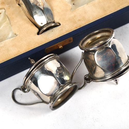 1377 - A George IV 5-piece silver cruet set, Birmingham 1931, in fitted case, and an odd silver plated salt