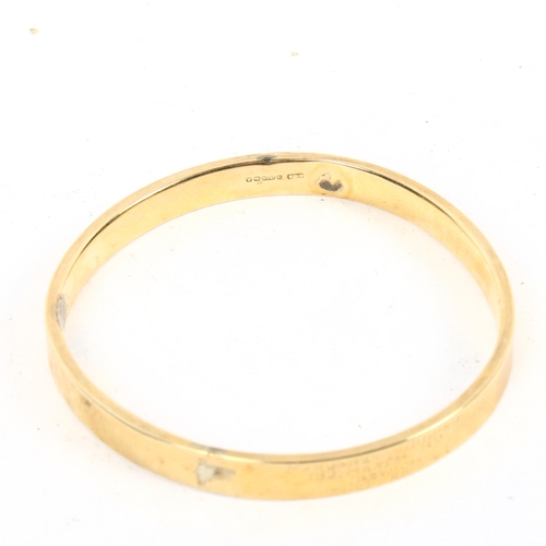 1383 - A 9ct gold bangle, with inscription, 9.9g