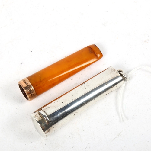 1390 - A 9ct gold-mounted amber cigarette holder, in an early 20th century tapered silver case, length 7cm