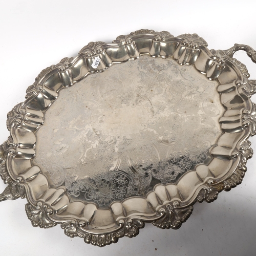 1394 - A silver plate on copper 2-handled ice/champagne bucket, and a plated 2-handled serving tray with em... 