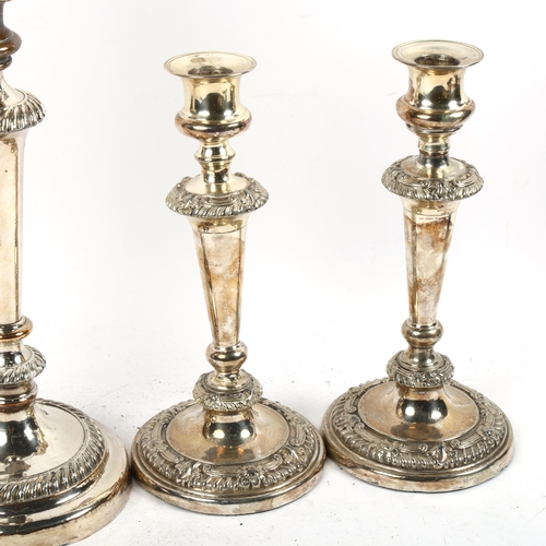 1397 - A pair of silver plated on copper candlesticks, allover embossed decoration, height 26cm, and a silv... 