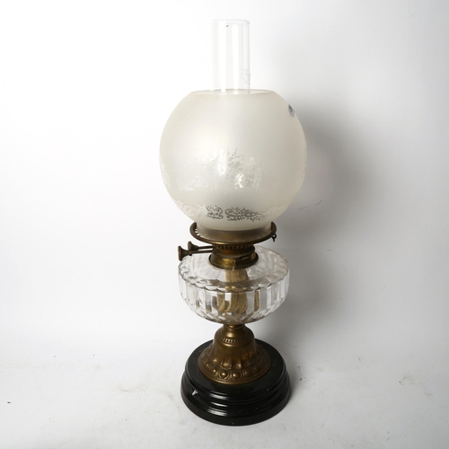 255 - A burr wood inset mantel barometer, width 66cm, and a Vintage oil lamp (2)