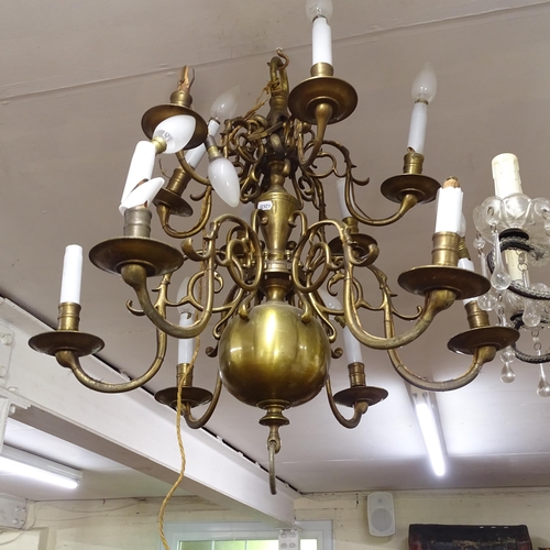 2420 - A Dutch brass 12-branch chandelier, W55cm