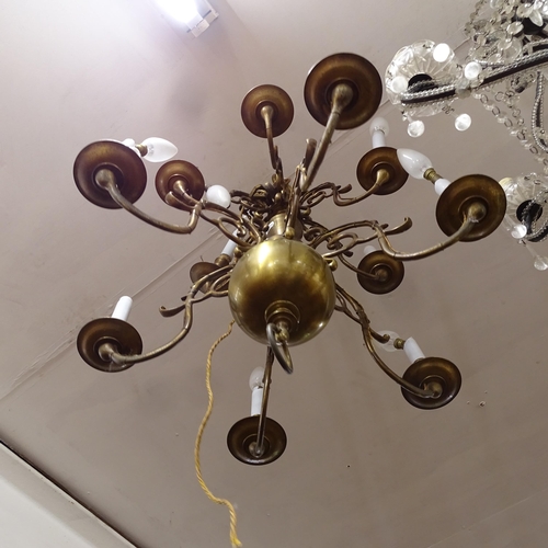 2420 - A Dutch brass 12-branch chandelier, W55cm