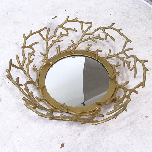 2427 - A modern circular gilt-framed wall mirror, with twig decoration, D56cm