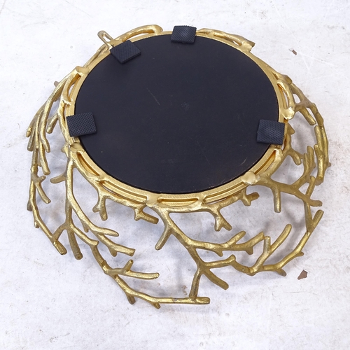 2427 - A modern circular gilt-framed wall mirror, with twig decoration, D56cm