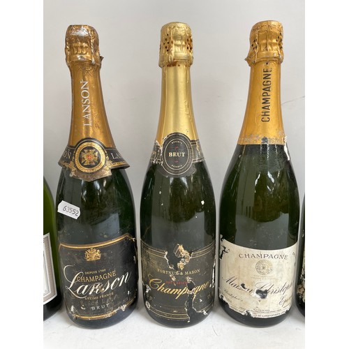 486 - 12 bottles of various Champagne and other sparkling wine, including Moet and Lanson