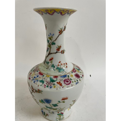 540 - A Chinese famille rose vase, with 6 character mark, 26cm