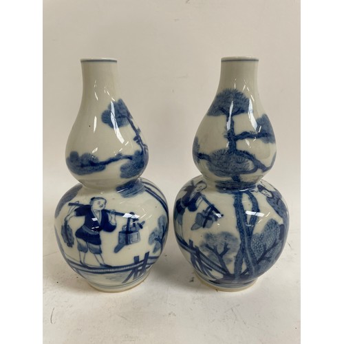 541 - A pair of Chinese blue and white double-gourd vases, 1 with 4 character mark, height 19cm