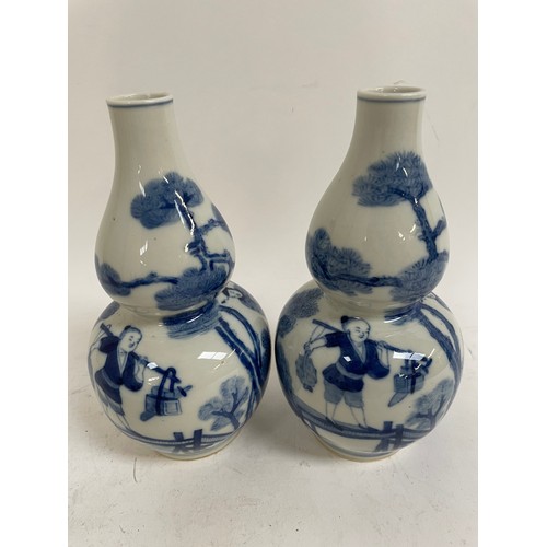 541 - A pair of Chinese blue and white double-gourd vases, 1 with 4 character mark, height 19cm