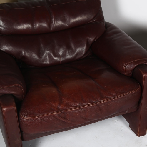 1555 - DE SEDE of Switzerland, a pair of mid-century leather armchairs, height 78cm