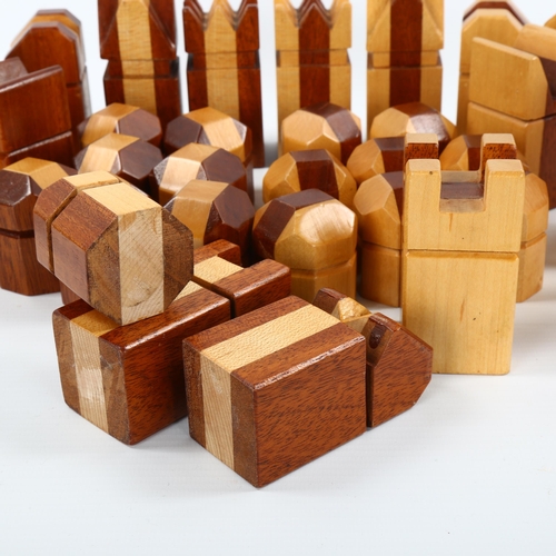 1561 - A Modernist teak and oak mid-century chess set, tallest 9cm