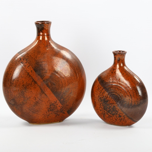 1569 - Two studio pottery pebble vases with tenmoku glaze, indistinct makers marks, tallest 22cm