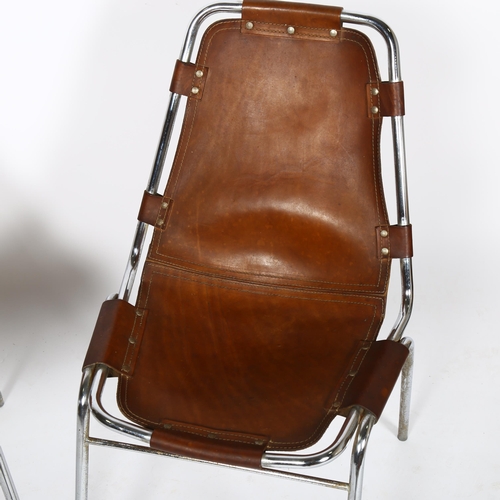 1611 - A pair of mid-century CHARLOTTE PERRIAND Les Arcs leather and chrome chairs, height 81cm