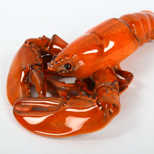 1622 - A ceramic wall hanging lobster, length 27cm