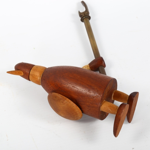 1636 - A mid-century teak Viking in the manner of KAY BOJENSEN, height 13.5cm