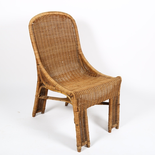 1643 - A 1950s French wicker chair in the manner of LOUIS SOGNOT, height 85cm